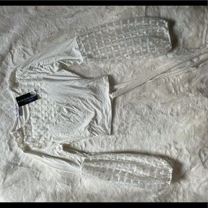 White puffy long sleeve blouse